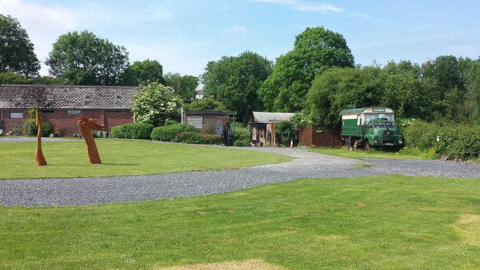 Pitch area and farm buildings