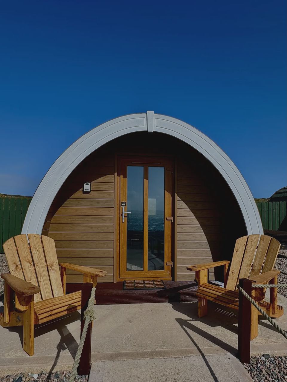 Pod with chairs out front