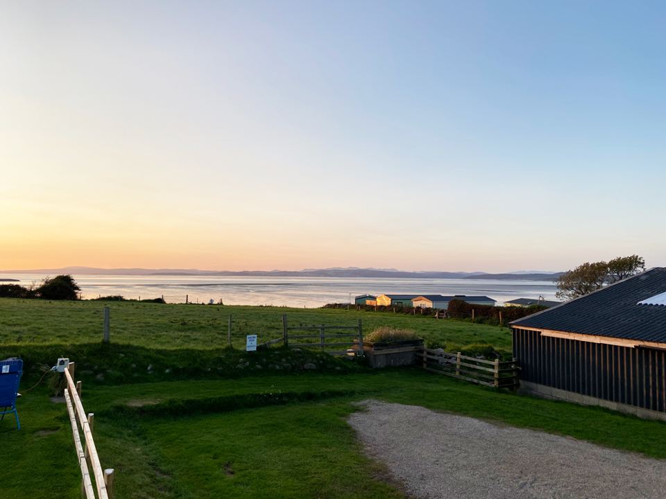 Grass pitch looking over the bay
