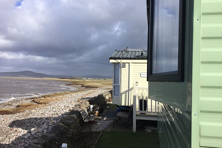 Static caravan beside the shore