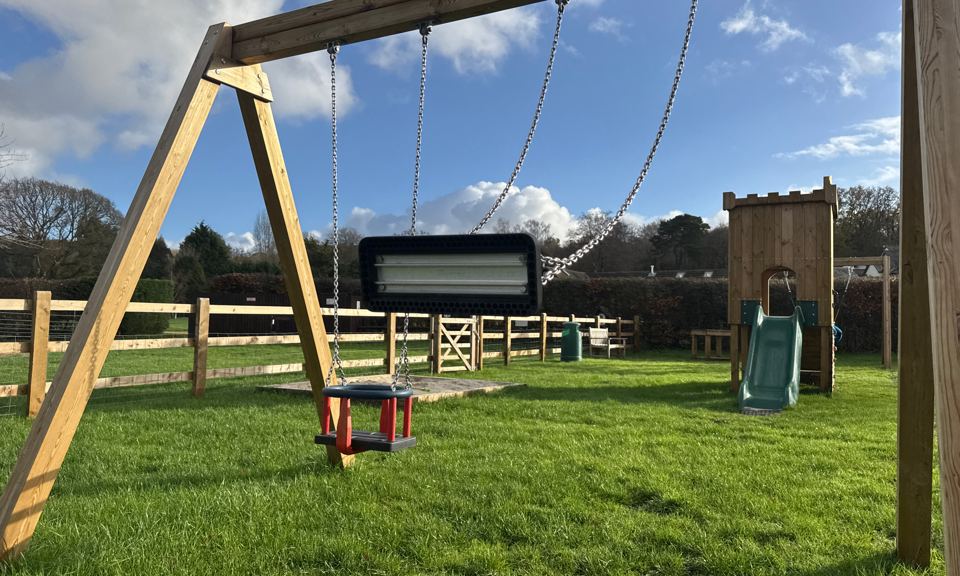 Swings and slide in the play park