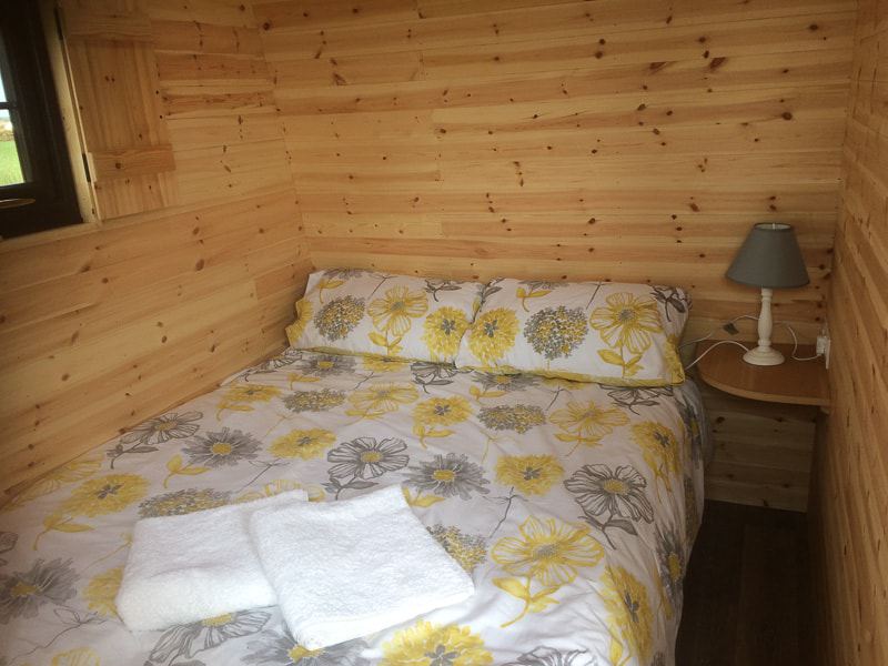 Double bed inside a pod