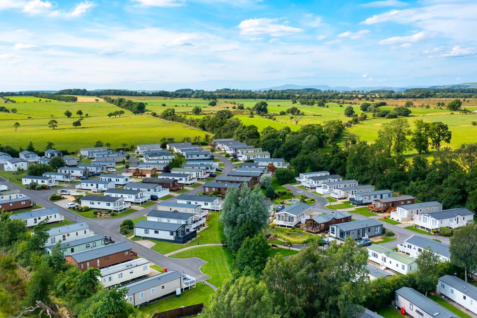 Caravans among green fields