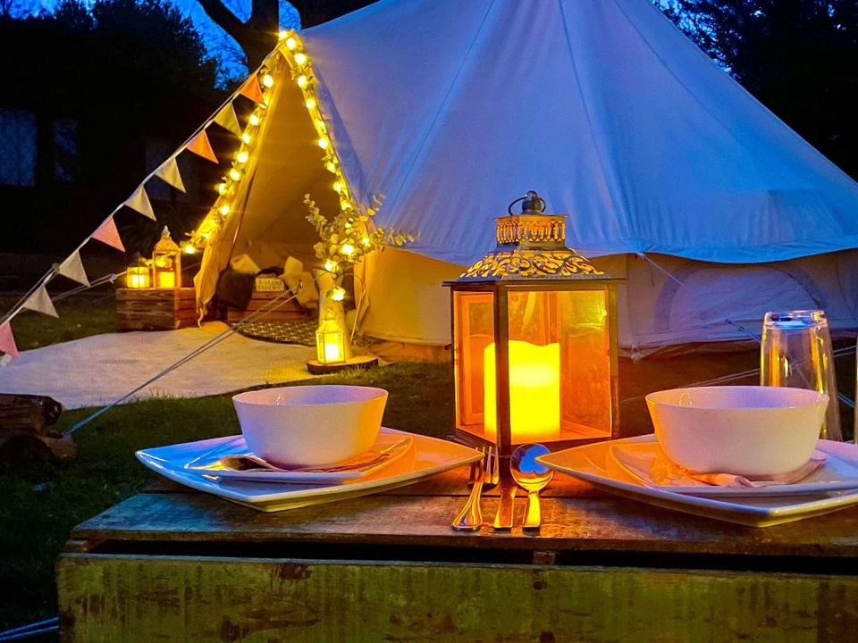 Dressed bell tent at night