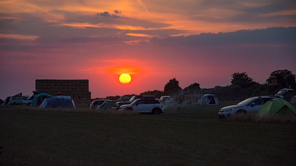 Sunset over the camping field