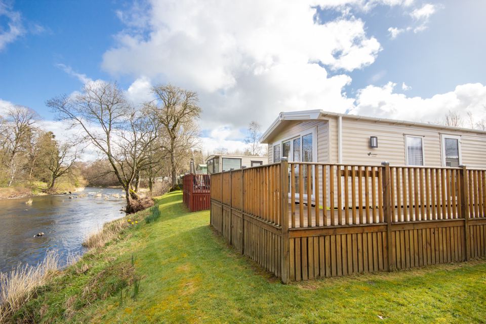 Caravan with fenced decking