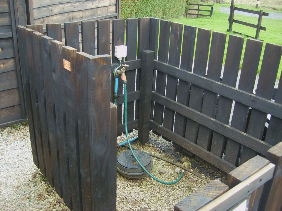 Hose point beside the fence