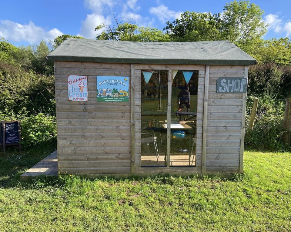 Shower hut in the grass
