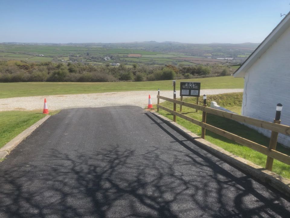 Entrance road with views over fields