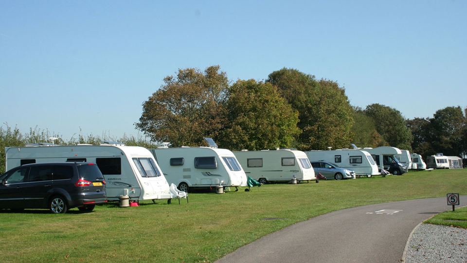 Row of caravans beside the path