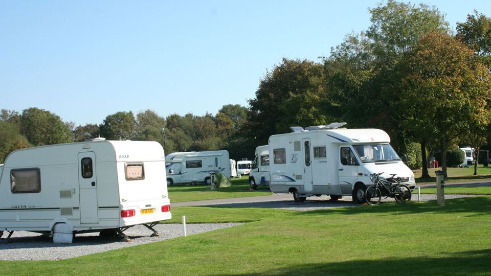 Caravans and motorhome on grass