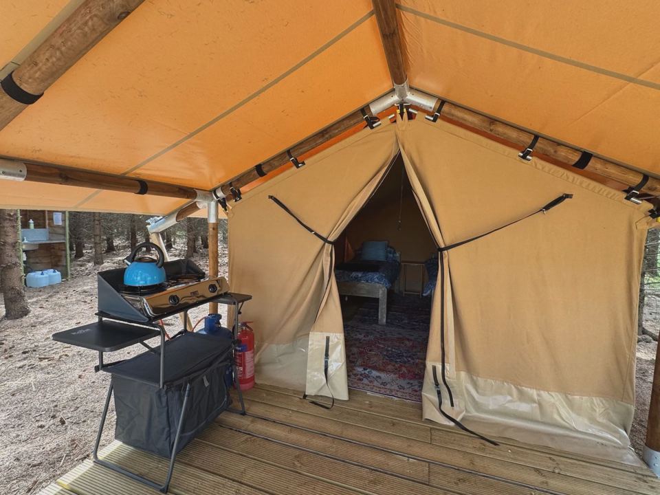 Tent front with camp kitchen