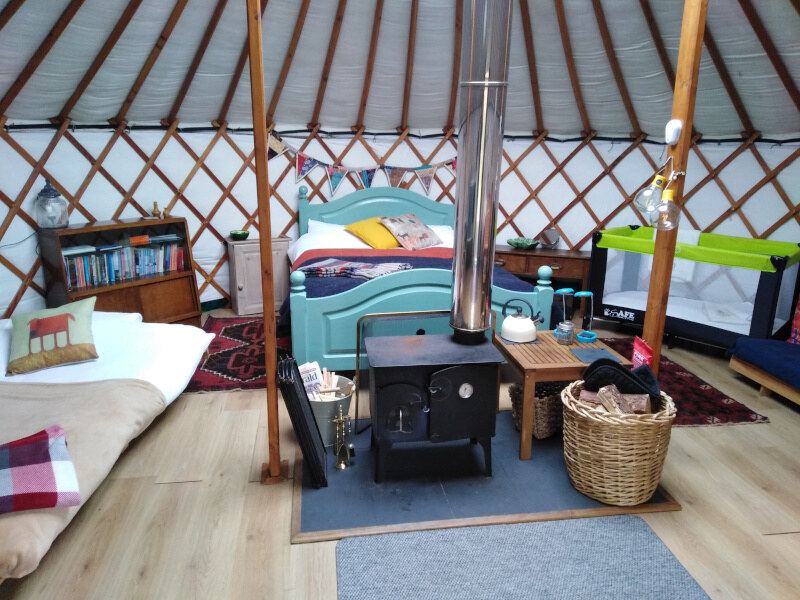 Yurt with wood stove and cot