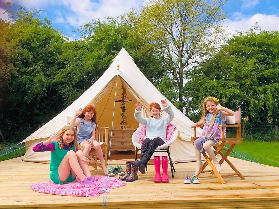 Bell tent on a wooden deck