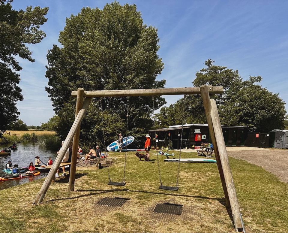 Swings by the river