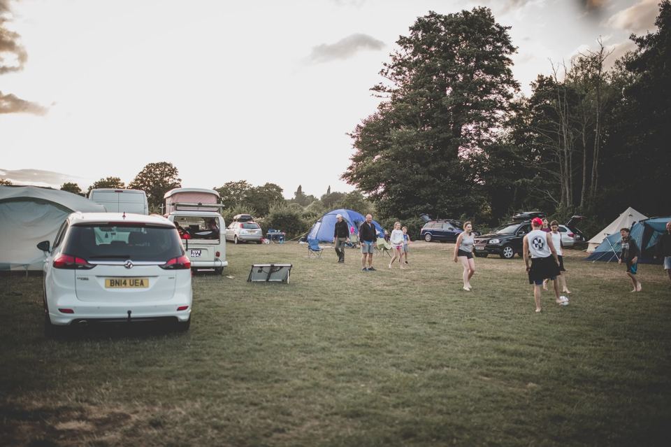 Grass pitches and cars