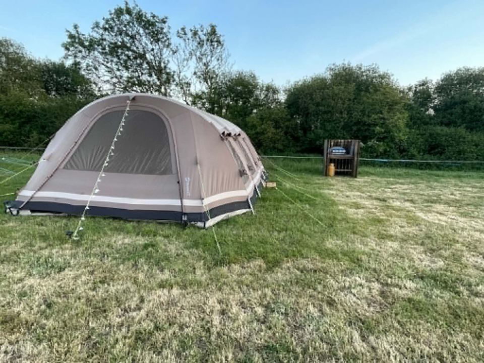 Tent pitched in the meadow