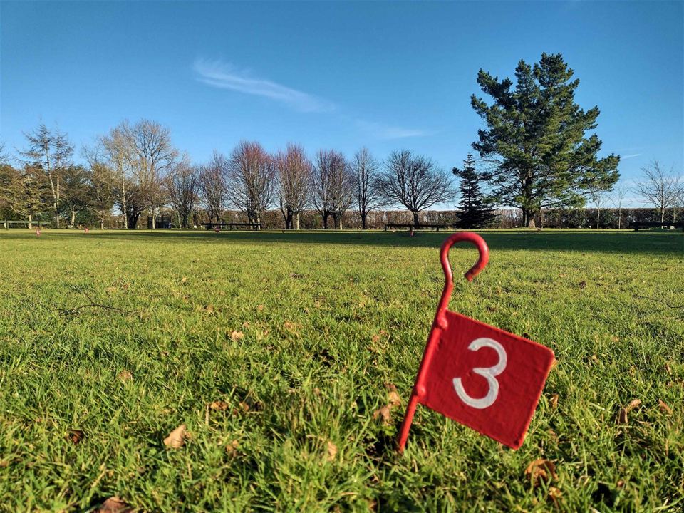 Pitch marker flag on the grass
