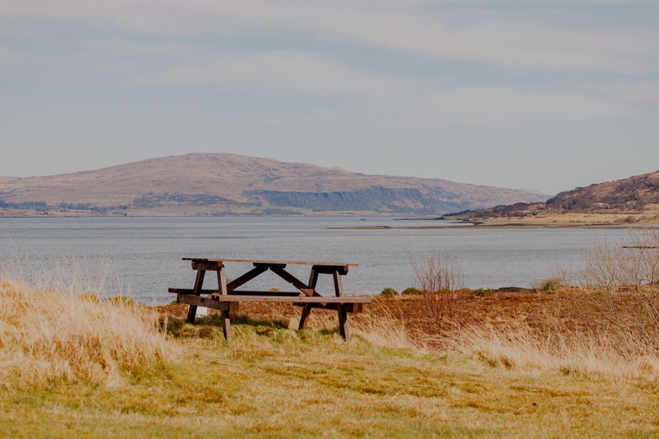 Picnic bench above the bay