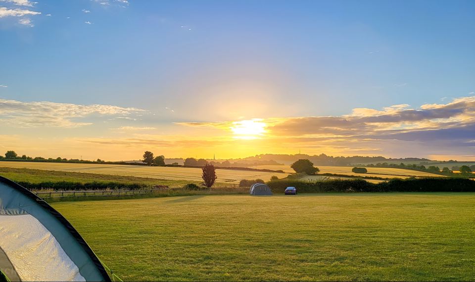 Sunset over the camping field