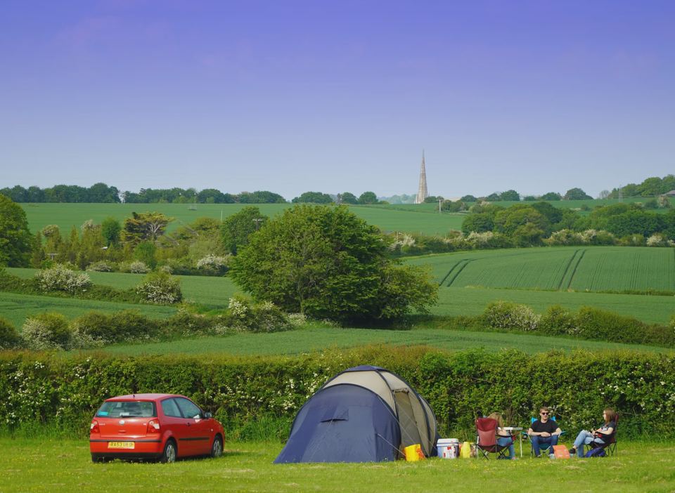 Tent with the cathedral spire beyond