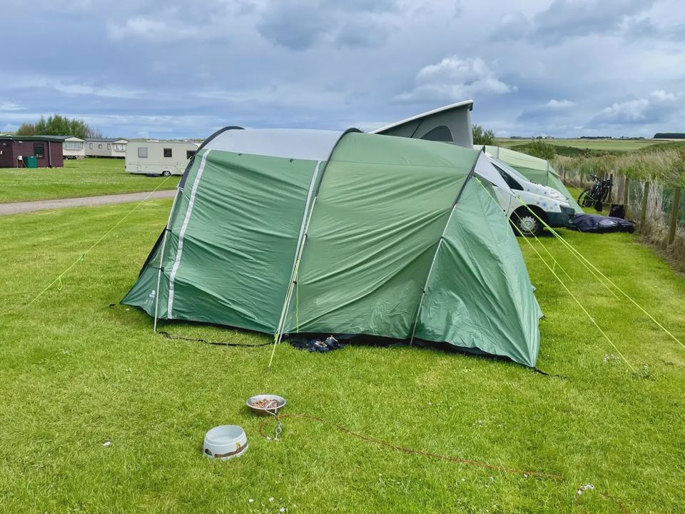 Tent next to a campervan