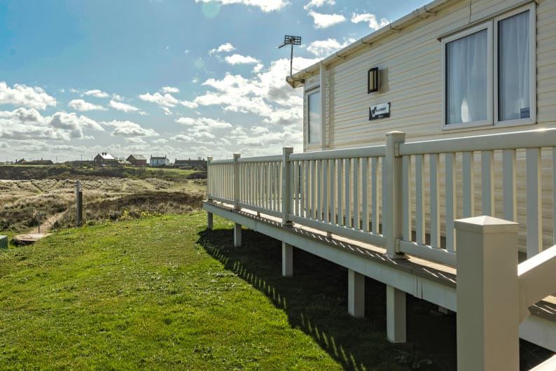 Static caravan with decking