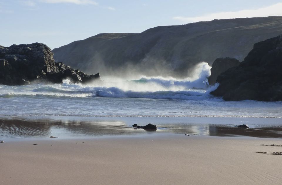 Waves breaking on the beach