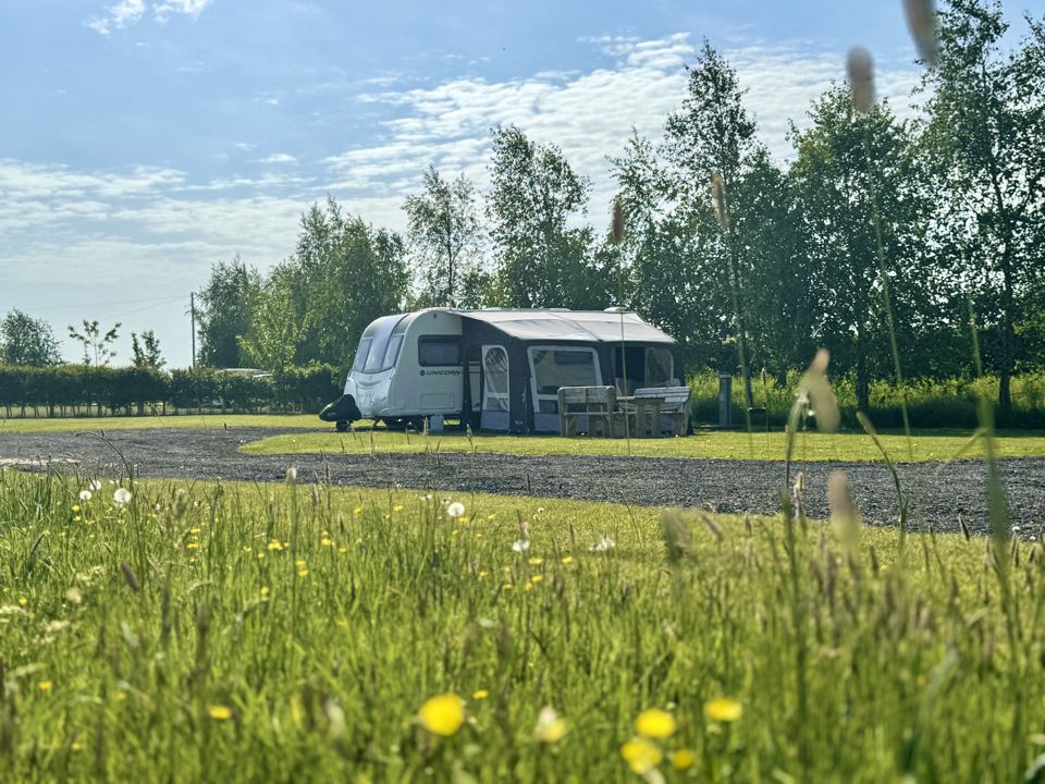 Caravan on a meadow pitch