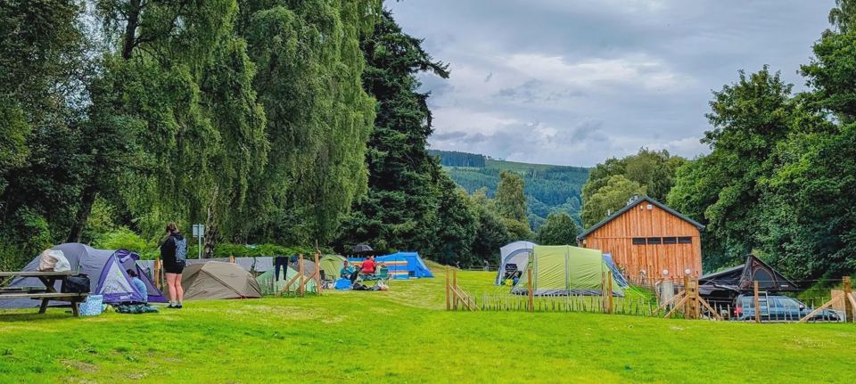 Tent field with the hills beyond