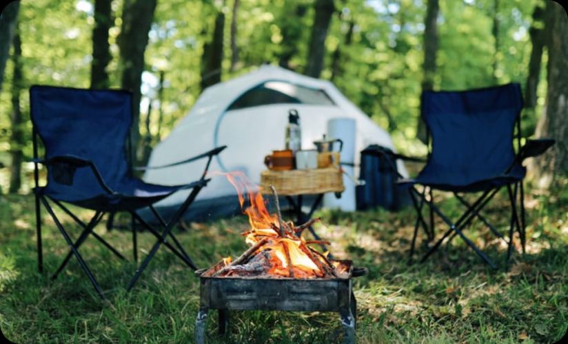 Tent and fire by the woods