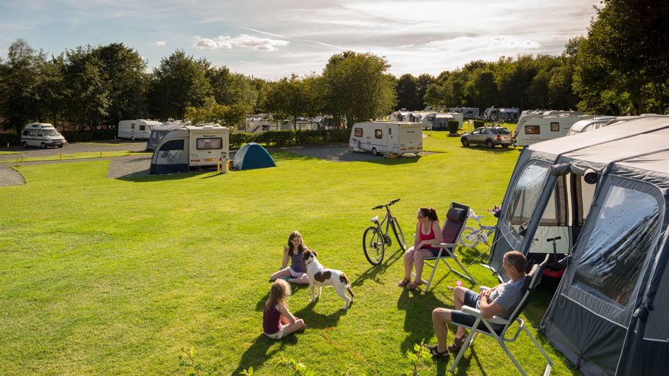 Grass pitches with awnings