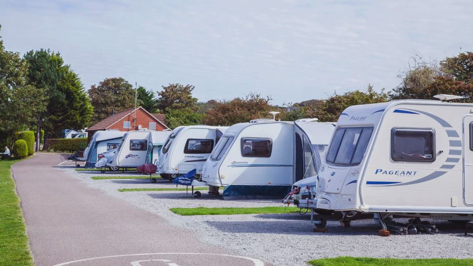 Row of caravans on hardstanding