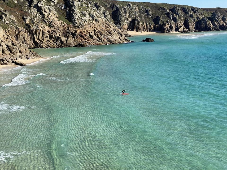 Sandy cove between the cliffs