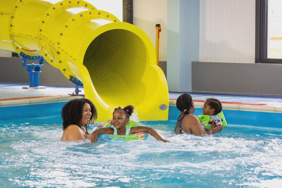 Indoor pool with flume