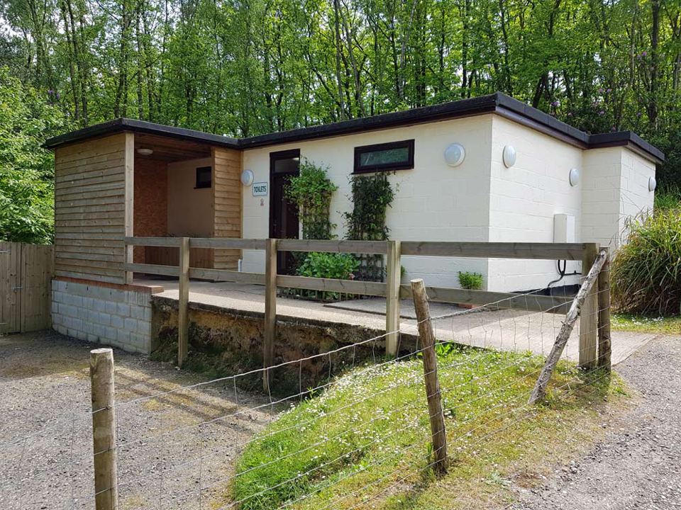 Toilet and shower block