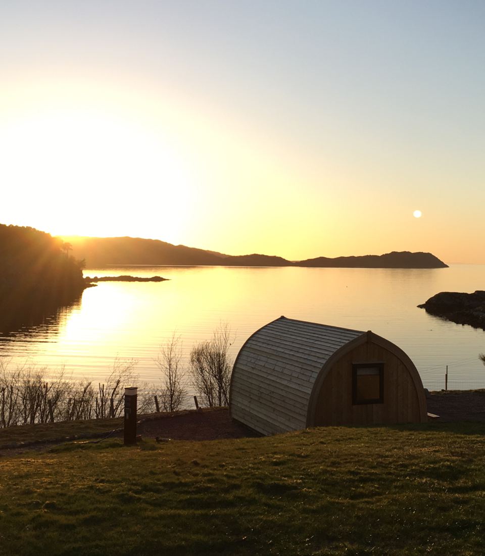 Cabin facing the loch at sunset