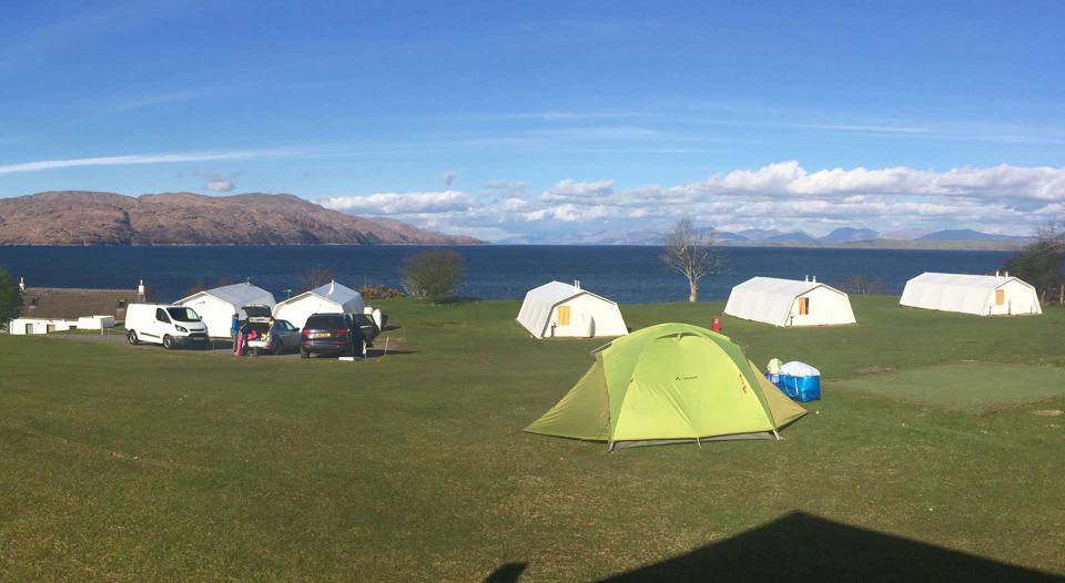 Tents and chalets above the sound