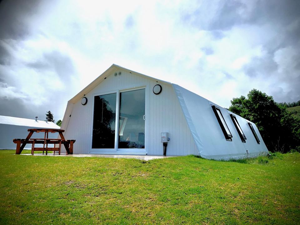 Glamping chalet on the grass