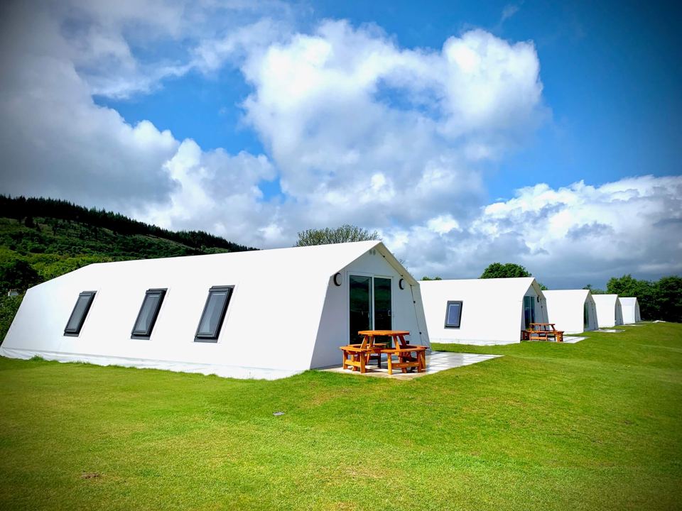 Row of glamping chalets