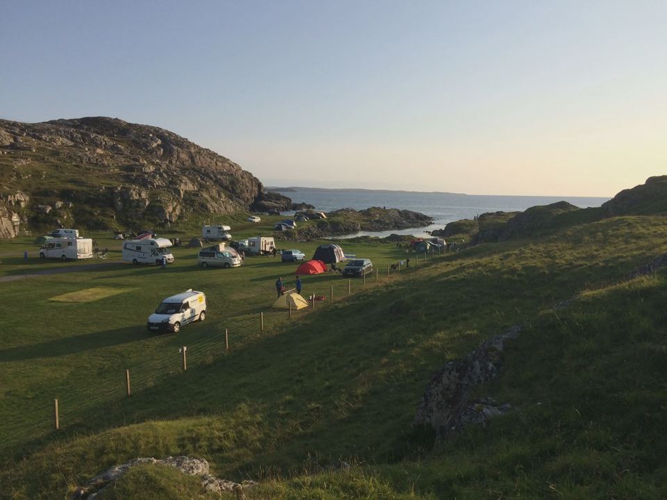 Motorhomes and tents on the slope