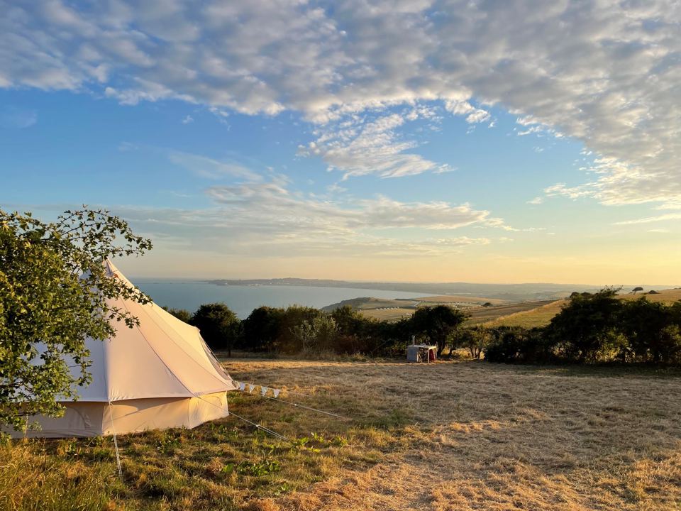 Bell tent looking over the sea