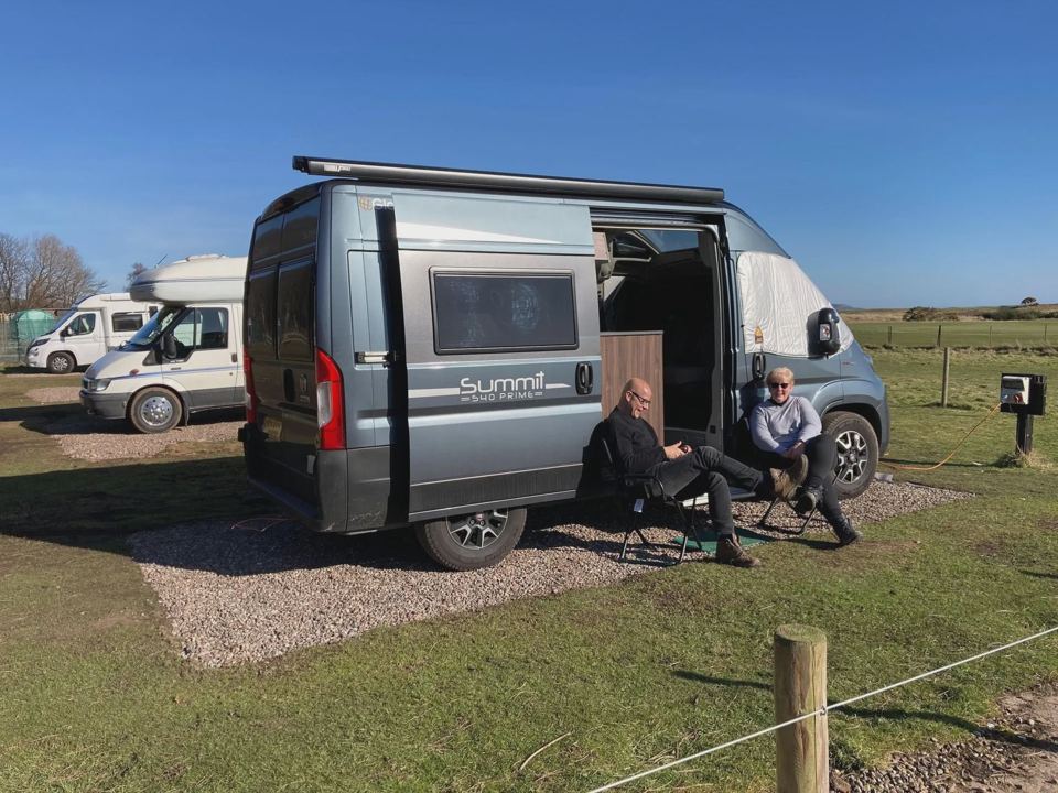 Campervan on a gravel pitch
