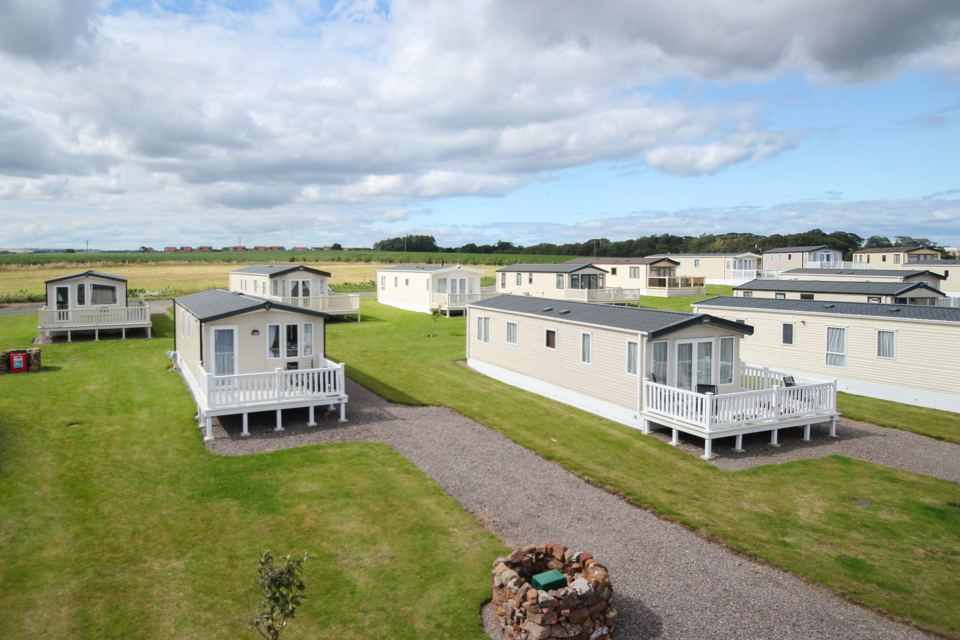 Holiday homes and grass from above