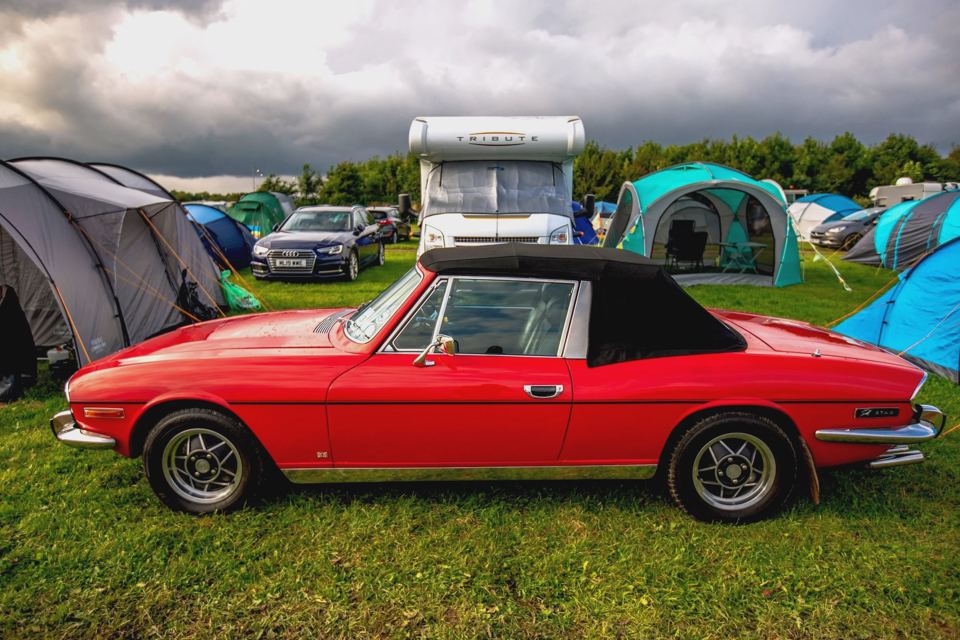 Classic car among the tents
