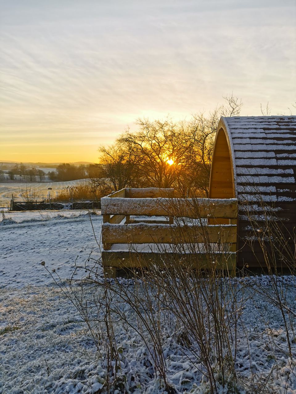 Pod at dawn with bench