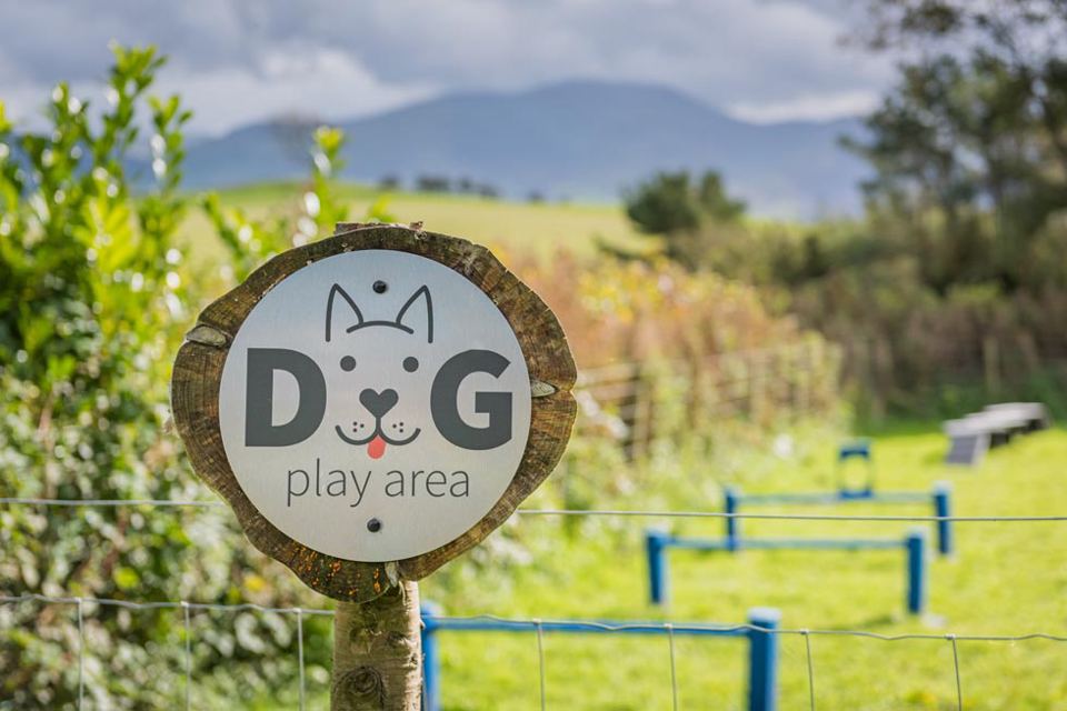 Dog play area sign