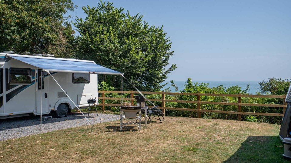 Awning and motorhome by the sea