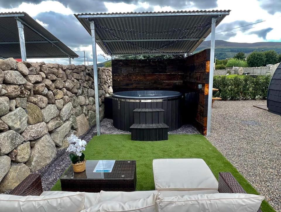Hot tub area with hill view