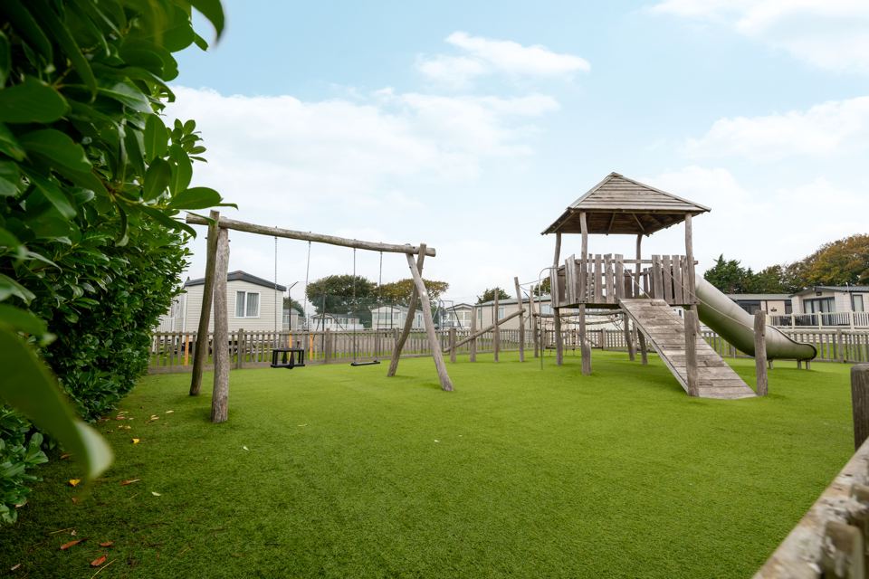 Play area with wooden tower